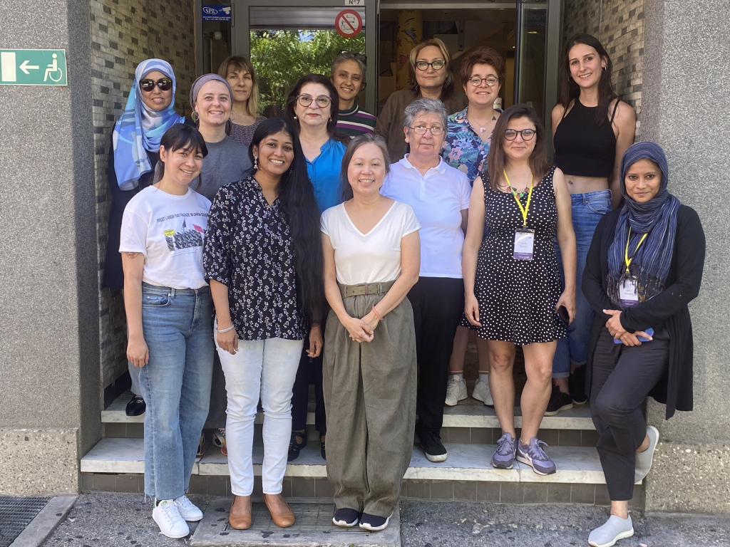 A group photo of women's rights activists from Azerbaijan, Namibia, Portugal and Turkey with members of the IWRAW Asia Pacific team.